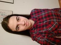 T.